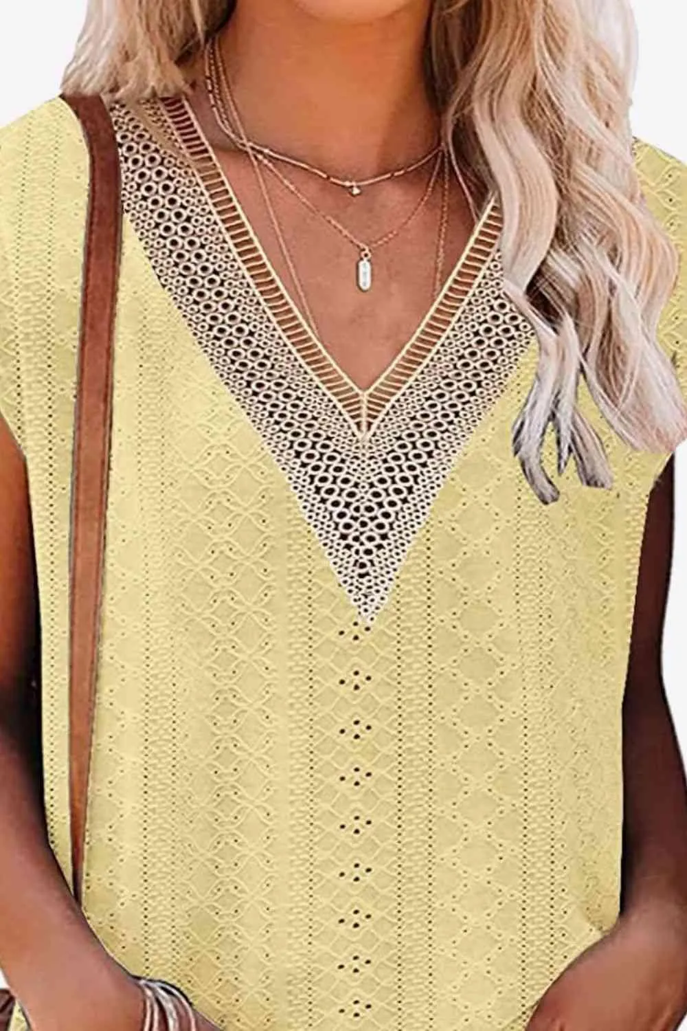 Elegant Eyelet Chevron V-Neck Tee with Stylish Openwork Design