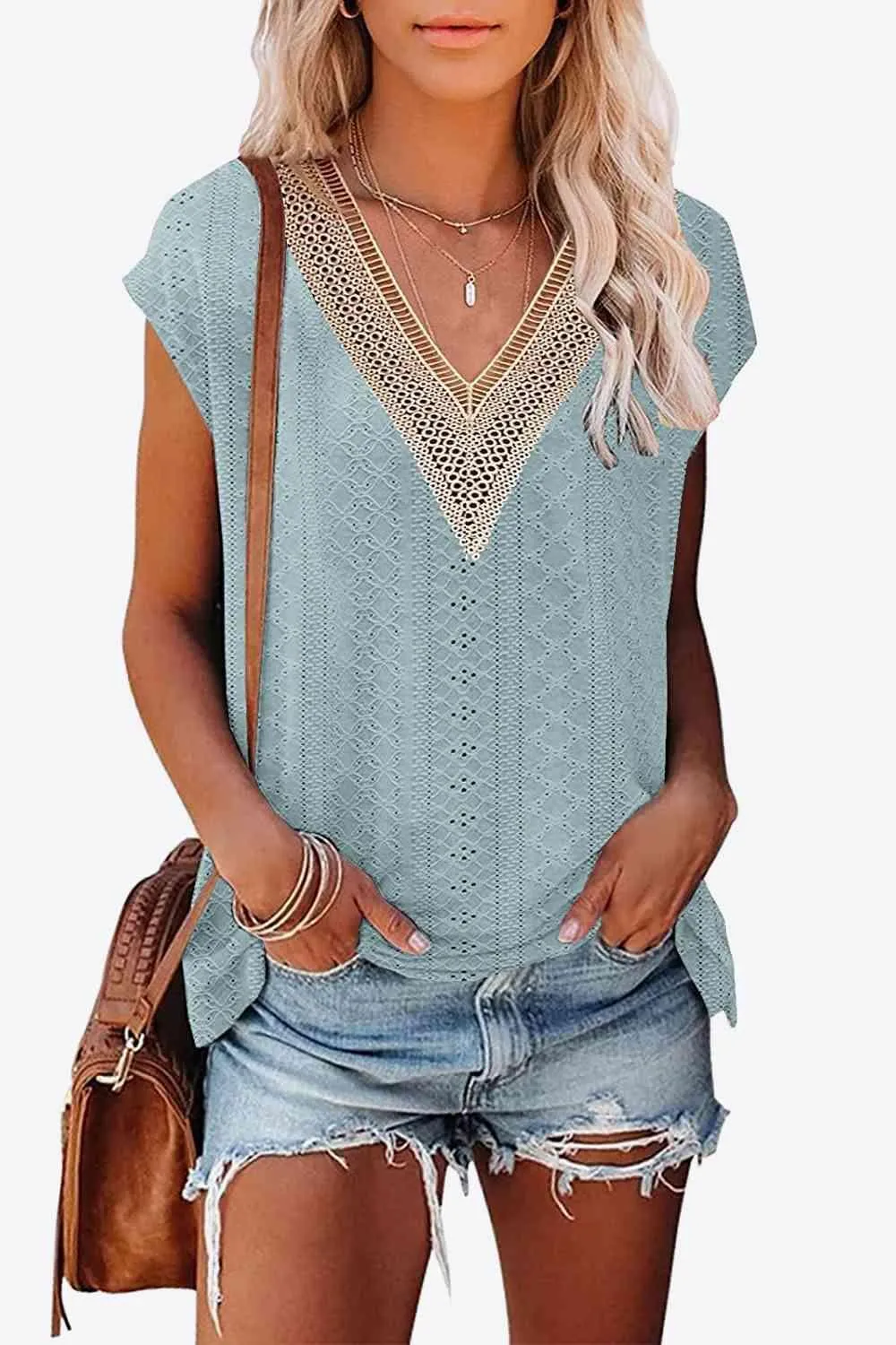 Elegant Eyelet Chevron V-Neck Tee with Stylish Openwork Design