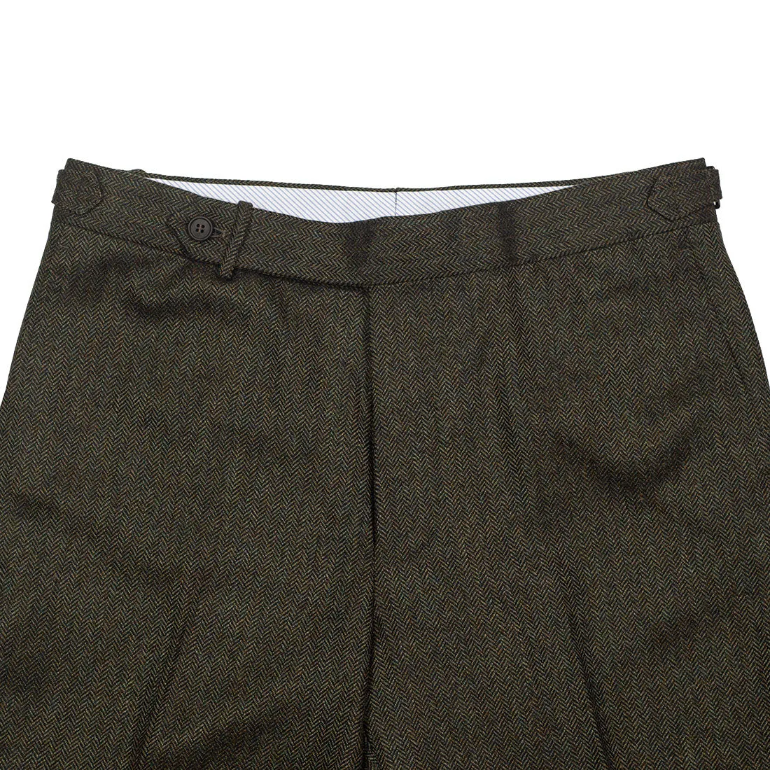 Higher-rise green herringbone flannel wool trousers with side tabs